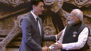Modi and Justin Trudeau જી-20 ફોટોસેશનમાં વાતચીત કરતા દેખાયા